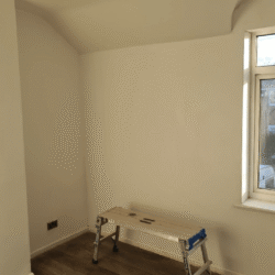 Bedroom 1 (After) - New engineered wooden flooring fitted and the room is fully decorated.