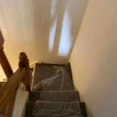 Stairs leading to the first floor of the house