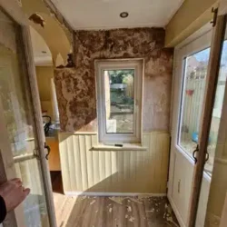 Kitchen Stripping out, skim and make ready to install wallpaper.